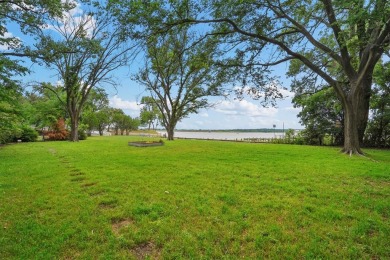 Darling lake cottage located on two of the largest Lake - Lake Home For Sale in Weatherford, Texas