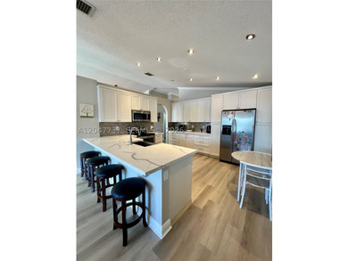 Beautifully maintained 3 bedroom 2 bath single family home in - photo 6