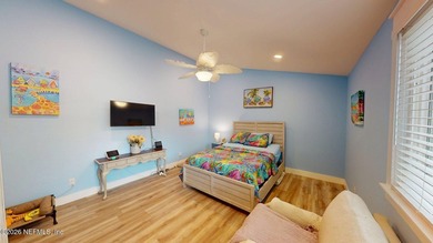 Prime location in Neptune Beach. This adorable coastal home is - photo 4