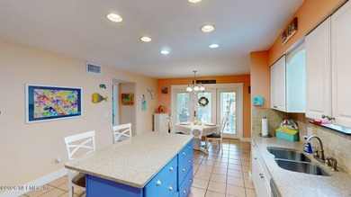 Prime location in Neptune Beach. This adorable coastal home is - photo 8
