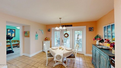 Prime location in Neptune Beach. This adorable coastal home is - photo 9
