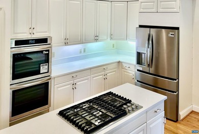 Back with new appliances & kitchen counters- golf front - photo 16