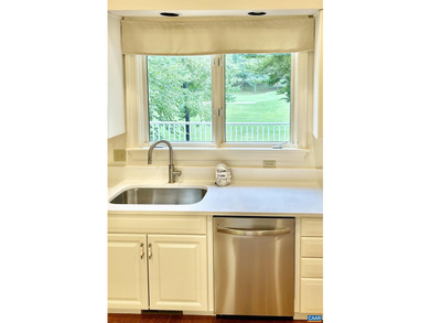 Back with new appliances & kitchen counters- golf front - photo 18