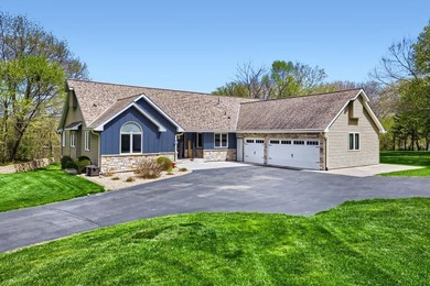 Experience refined riverfront living with this exceptional - photo 1