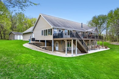 Experience refined riverfront living with this exceptional - photo 3