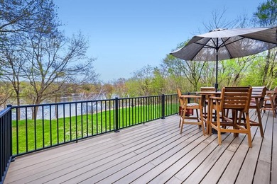 Experience refined riverfront living with this exceptional - photo 4