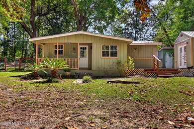 This home is tucked away on a 3 acre parcel. This charming 2 - photo 1