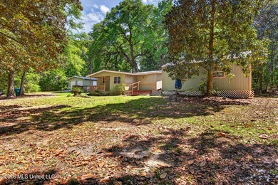 This home is tucked away on a 3 acre parcel. This charming 2 - photo 3