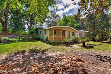 This home is tucked away on a 3 acre parcel. This charming 2 - photo 4