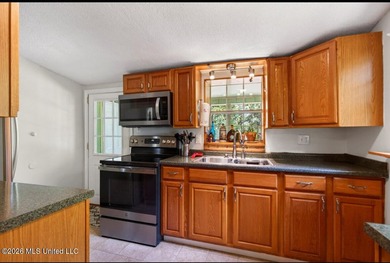 This home is tucked away on a 3 acre parcel. This charming 2 - photo 9