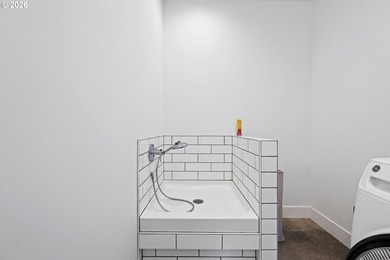 This exquisite 2023 custom-built residence, thoughtfully - photo 13