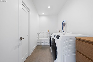This exquisite 2023 custom-built residence, thoughtfully - photo 14