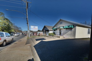 HIGH TRAFFIC COUNT ON CENTRAL AVE BUILDING--SET UP FOR OFFICES