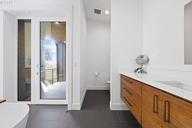 This exquisite 2023 custom-built residence, thoughtfully - photo 23