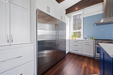 This exquisite 2023 custom-built residence, thoughtfully - photo 32