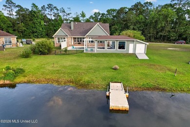 GULF COAST HIDDEN GEM ON A PRIVATE LAKE Welcome to this stunning - photo 7