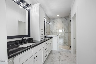 Welcome to an extraordinary new construction waterfront home - photo 14