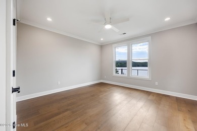 Welcome to an extraordinary new construction waterfront home - photo 21