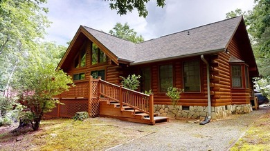 Meticulously maintained log cabin located in River Ridge estates - photo 3