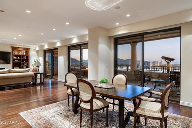 Anchored by an extraordinarily large 36-foot balcony, this