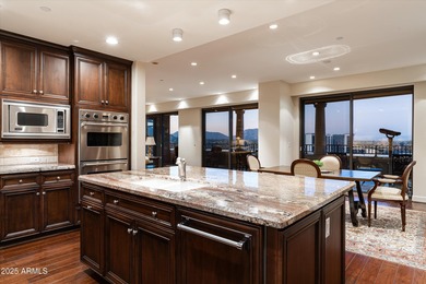 Anchored by an extraordinarily large 36-foot balcony, this