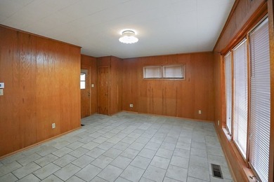 This charming home is loaded with character! Lovely tile front - photo 12