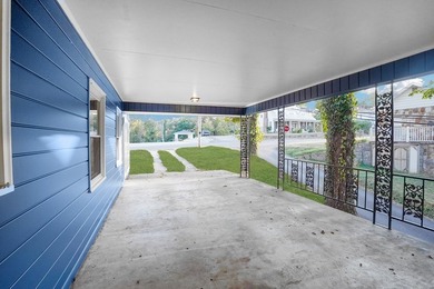 This charming home is loaded with character! Lovely tile front - photo 13