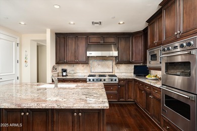 Anchored by an extraordinarily large 36-foot balcony, this