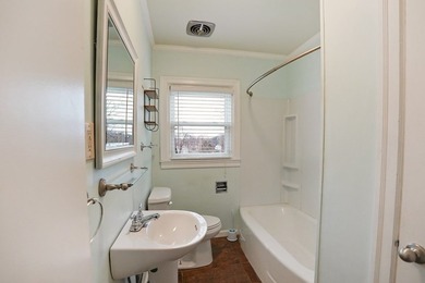 This charming home is loaded with character! Lovely tile front - photo 16