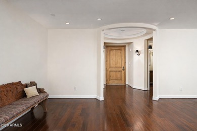 Anchored by an extraordinarily large 36-foot balcony, this