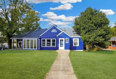 This charming home is loaded with character! Lovely tile front - photo 22