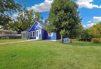 This charming home is loaded with character! Lovely tile front - photo 23