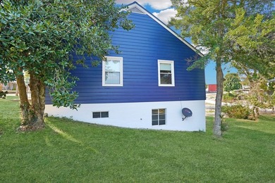 This charming home is loaded with character! Lovely tile front - photo 24