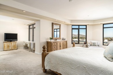 Anchored by an extraordinarily large 36-foot balcony, this