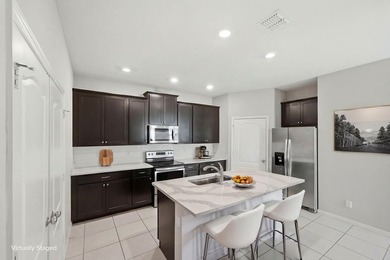 Welcome to this spacious 4-bedroom, 2-bathroom townhome built in - photo 7