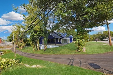 This charming home is loaded with character! Lovely tile front - photo 27