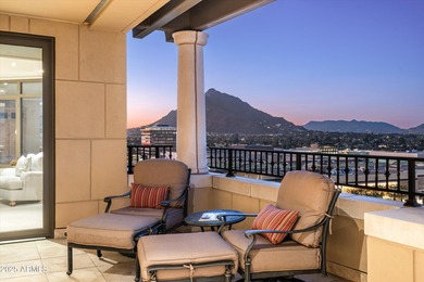 Anchored by an extraordinarily large 36-foot balcony, this