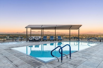 Anchored by an extraordinarily large 36-foot balcony, this