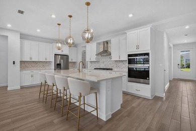 This layout impressively opens into the main living areas - photo 8
