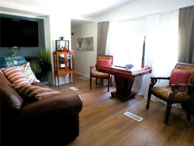 This updated, 2-bedroom, 1.5-bath mobile home, built in 1973 - photo 18