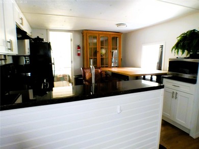 This updated, 2-bedroom, 1.5-bath mobile home, built in 1973 - photo 21