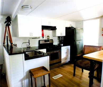 This updated, 2-bedroom, 1.5-bath mobile home, built in 1973 - photo 23
