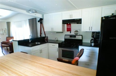 This updated, 2-bedroom, 1.5-bath mobile home, built in 1973 - photo 24