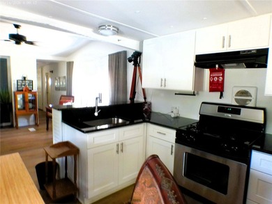 This updated, 2-bedroom, 1.5-bath mobile home, built in 1973 - photo 27