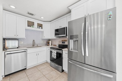Welcome to this tastefully updated townhome offering comfort - photo 21