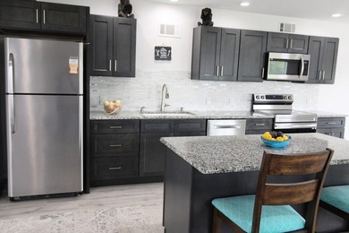 Escape to your own coastal paradise in this completely renovated - photo 24
