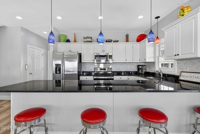 Welcome to this beautifully maintained oceanfront duplex in the