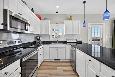 Welcome to this beautifully maintained oceanfront duplex in the