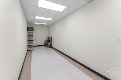 Flex space with multiple offices, break room, 2 restrooms and - photo 6