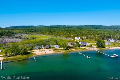 Nestled along the north shore of Portage Lake with 68 feet of - photo 4